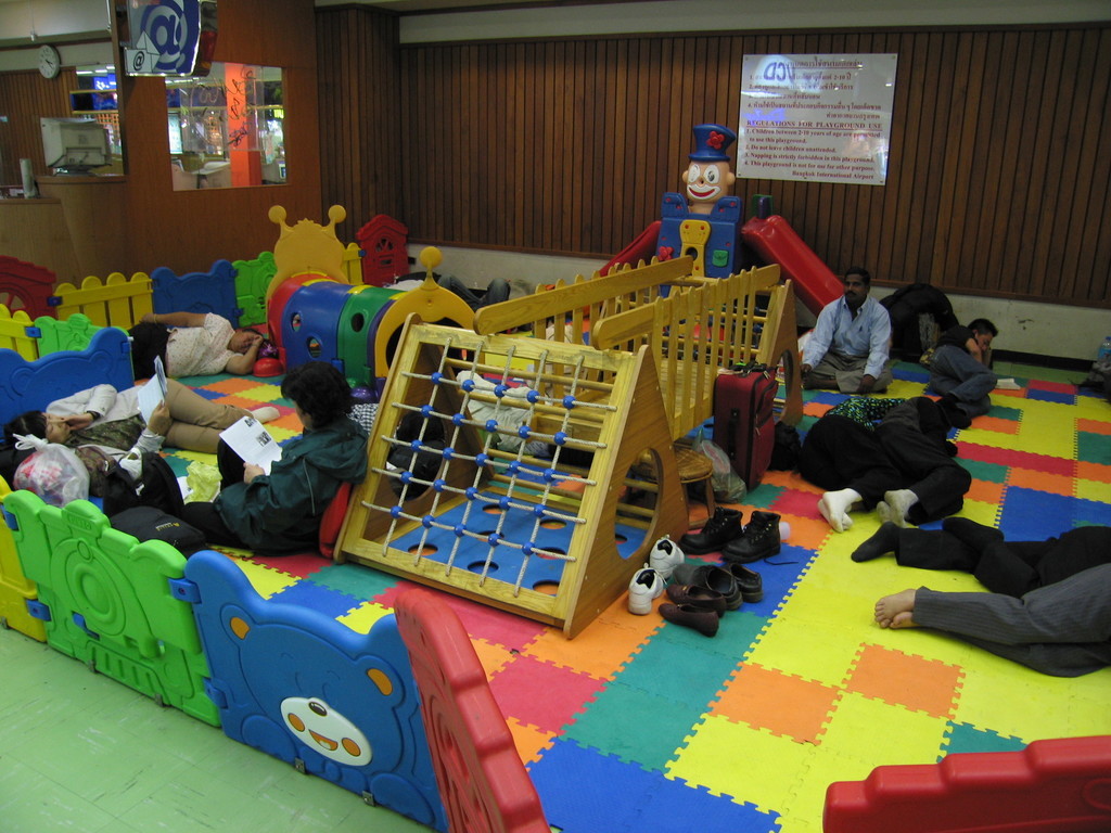 "Napping is strictly forbidden in this playground" (at Bangkok airport).