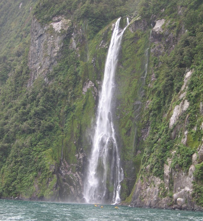 The kayaks sure do look tiny against the waterfall; can you spot the yellow pixel?