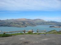 Christchurch's harbour Lyttleton Harbour, which is separated from Christchurch by the Port Hills, forming the beginning of the Banks Peninsula. The facilities are mostly concealed in the lower foreground.