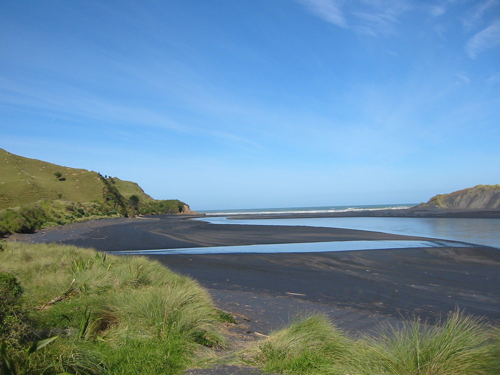 beautiful shore with dark, mineral-rich sand at the west coast